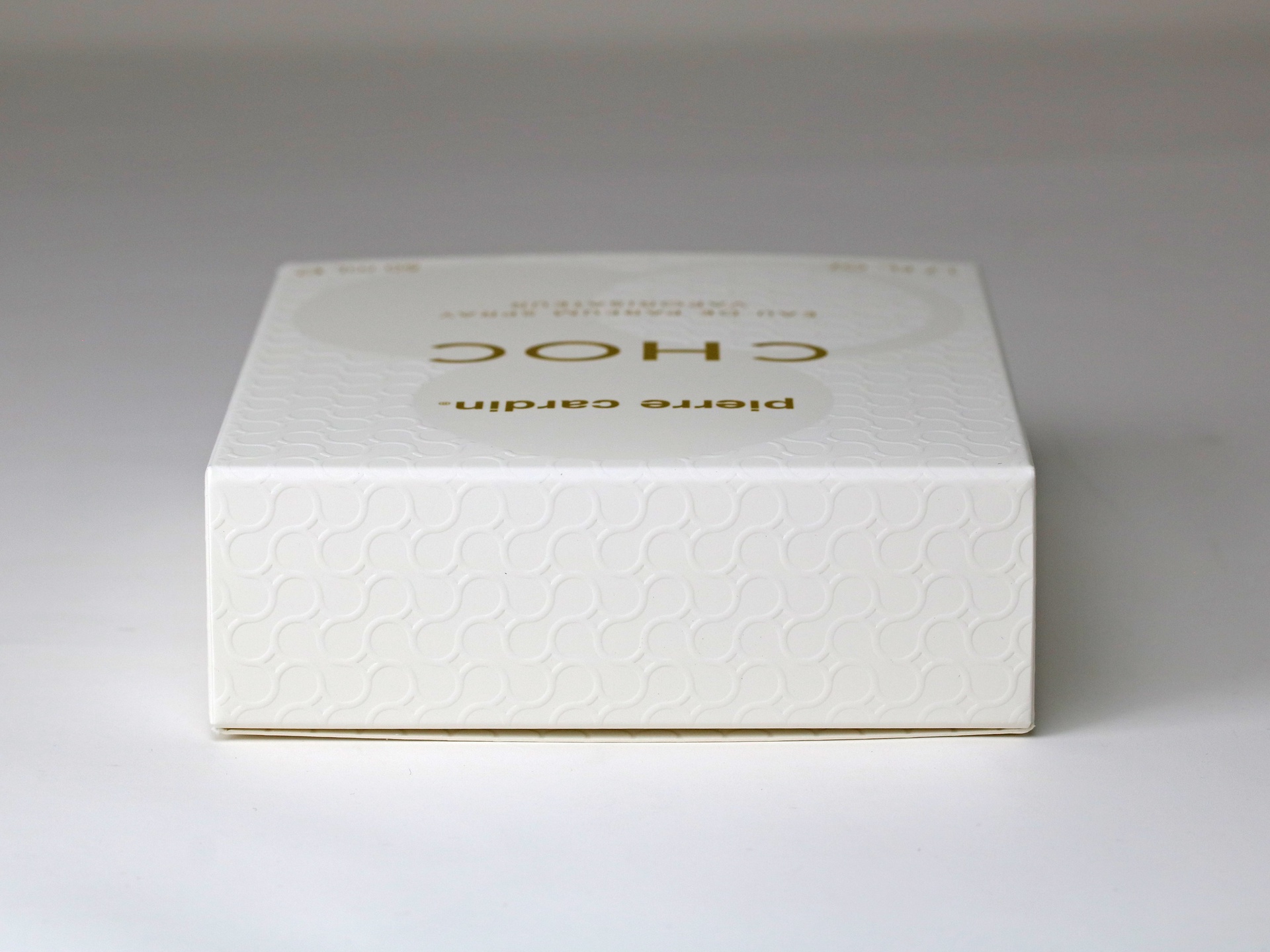 Pierre Cardin Choc folding carton features soft touch coating