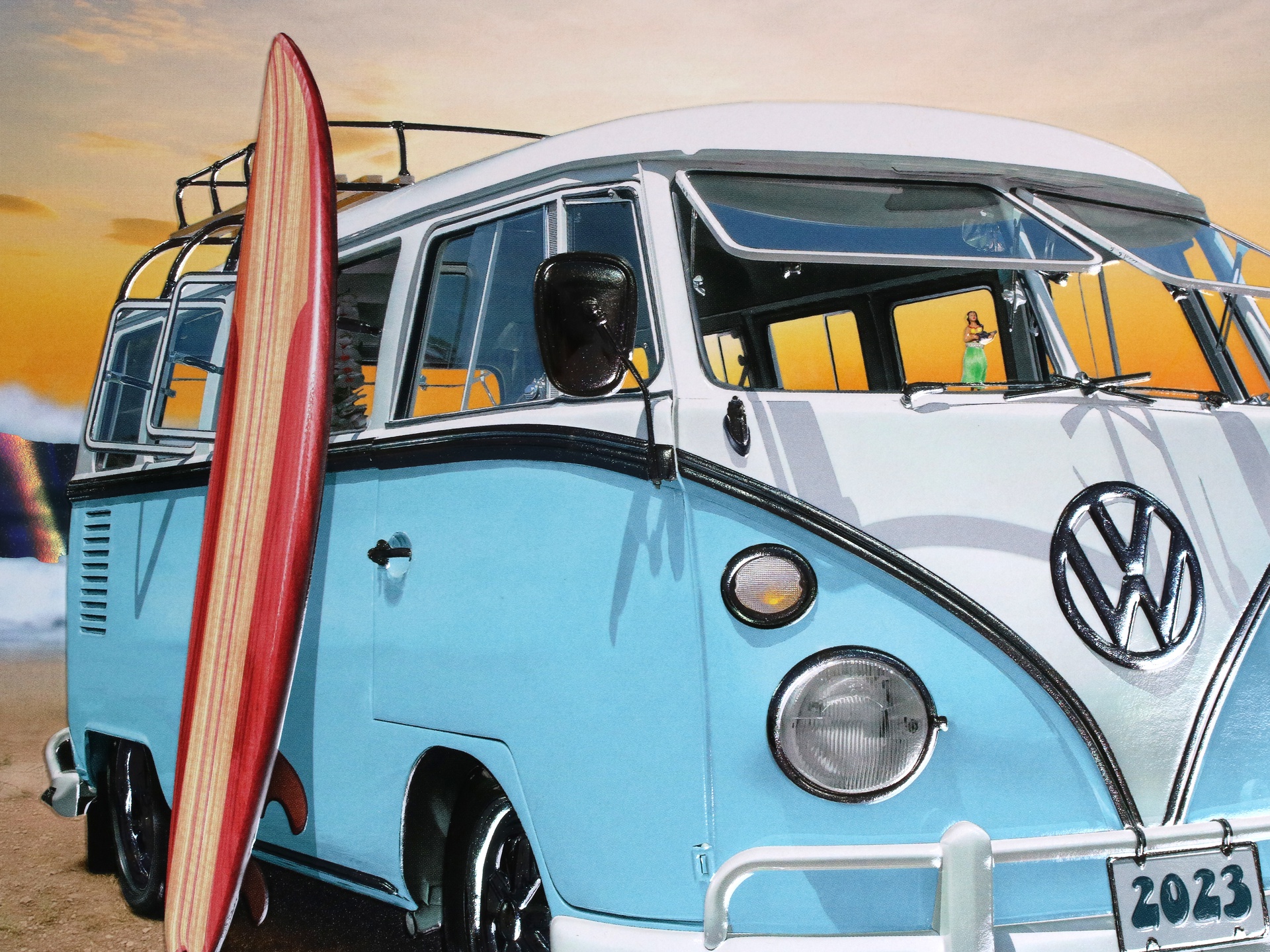 Cold foil delivers shimmering metallic effects on the 1966 Volkswagen Type 2 Bus and Surf's Up 2023 and Diamond Packaging text.